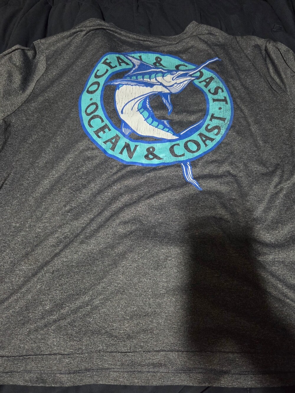 Ocean & Coast Men’s Charcoal Long Sleeve Performance Shirt with Marlin Graphic